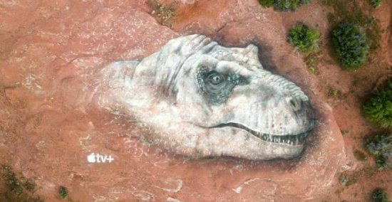 美国艺术家在岩石上创造巨幅霸王龙壁画