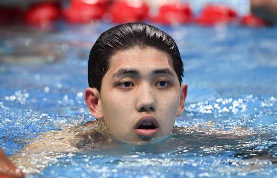 杭州亚运会·闲记丨泳帽掉了，他这次戴了两层