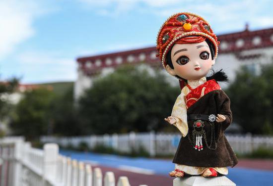 新时代中国调研行·黄河篇丨黄河畔的“吉祥娃娃”